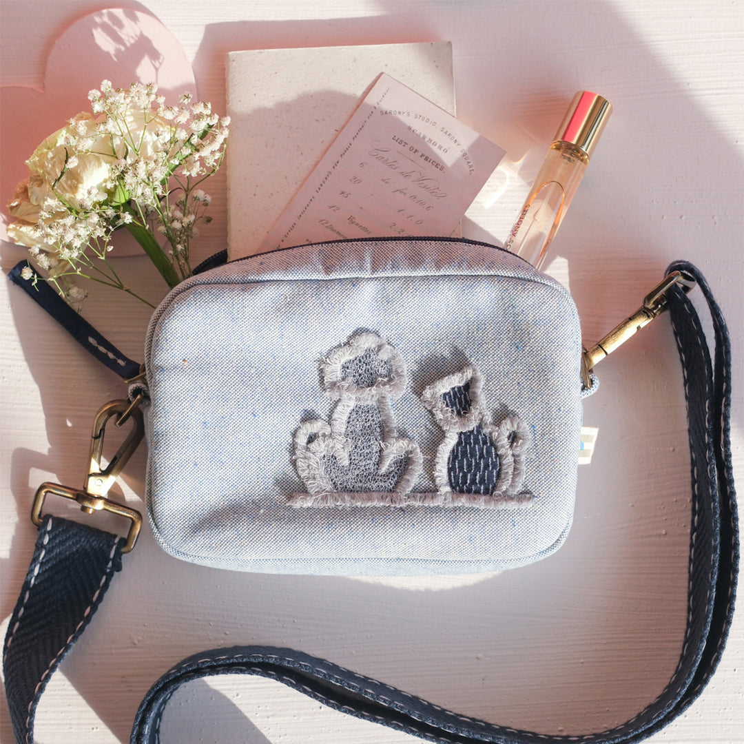 The FAR Store Tailmates Crossbody Bag for Pet Parents